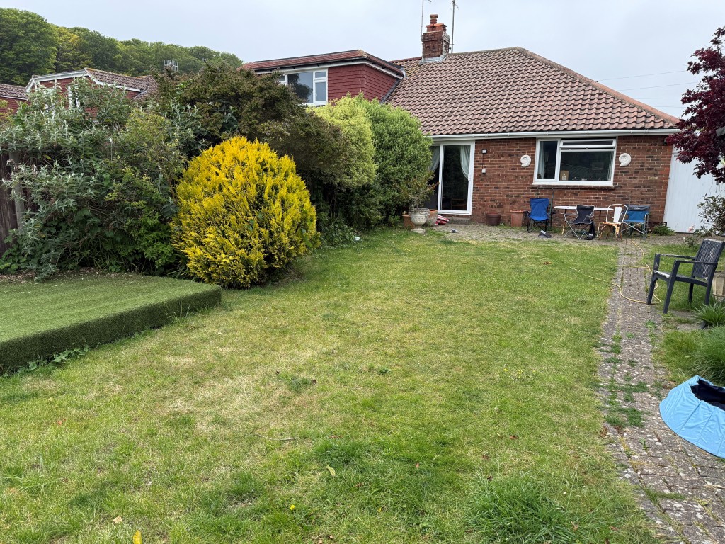 Lot: 137 - BUNGALOW WITH POTENTIAL IN FAVOURED LOCATION - View of property from rear garden